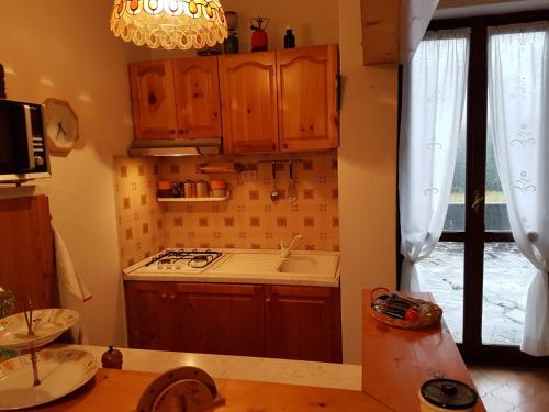 Kuchyň nebo kuchyňský kout v ubytování Home Cremeno Valsassina