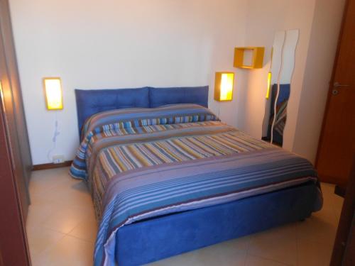 Postel nebo postele na pokoji v ubytování B&B Verdeblu