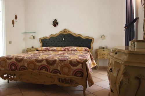 Giường trong phòng chung tại Tropea rooftop