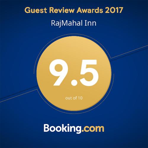 a yellow circle with the number on it at Raj Mahal Inn in Wadduwa