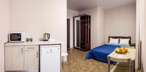 Kuchyň nebo kuchyňský kout v ubytování Apart Hotel Smart Studio