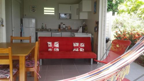 Kuchyň nebo kuchyňský kout v ubytování Bungalow le manikou