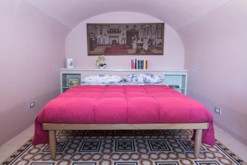 En eller flere senge i et værelse på Casa Katy