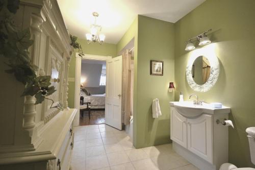 a bathroom with a sink and a mirror at Briarwood Bed & Breakfast in Elmsdale