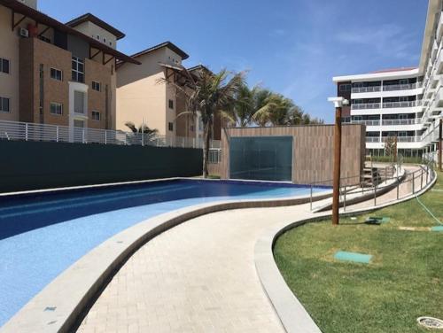 Bazén v ubytování Apartamento no Porto das Dunas - Beach Way nebo v jeho okolí