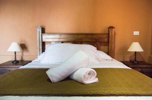 Cama o camas de una habitación en Cabañas San Isidro