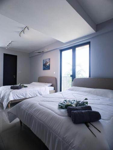 Ένα ή περισσότερα κρεβάτια σε δωμάτιο στο Yamada Residence, Trefoil
