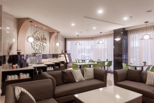 Posezení v ubytování Maple Hotel
