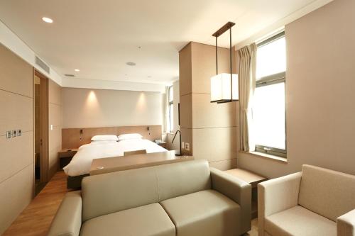 Posezení v ubytování Mayplace Hotel