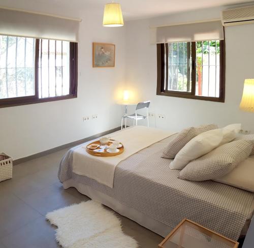 Cama o camas de una habitación en Quiet House in Malaga