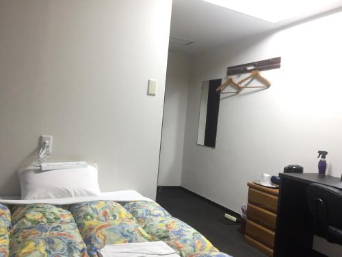 Postel nebo postele na pokoji v ubytování Hotel Todai