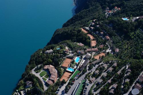 an aerial view of a mountain with houses and cars at Village Bazzanega - Montagnoli Group in Tremosine Sul Garda