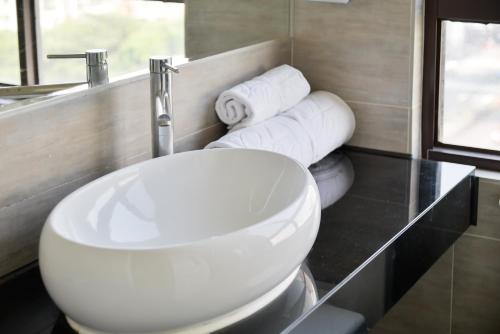 Koupelna v ubytování Bonjour Hotel