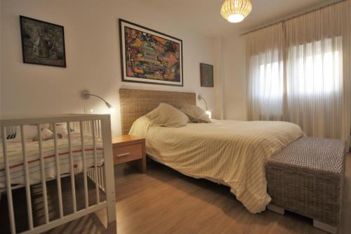 Ένα ή περισσότερα κρεβάτια σε δωμάτιο στο Bonito apart. con PARKING Y PISCINA