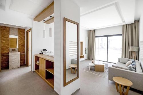 Letto o letti in una camera di Les Orangers Garden Villas and Bungalows Ultra All inclusive