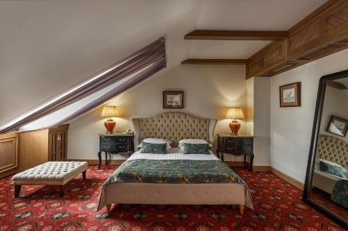 Postel nebo postele na pokoji v ubytování BOUTIQUE HOTEL AMBASSADORI MOSCOW