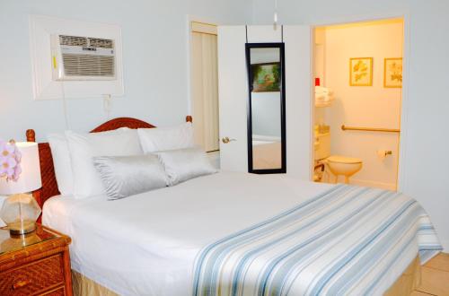 Postel nebo postele na pokoji v ubytování Sea Turtle Inn