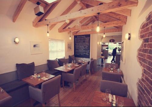Ein Sitzbereich in der Unterkunft Morleys Rooms - Located in the heart of Hurstpierpoint by Huluki Sussex Stays