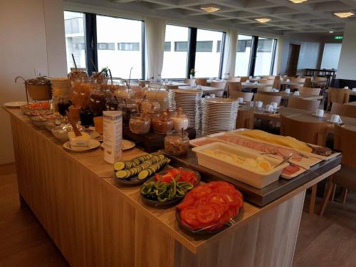 Un restaurante o sitio para comer en Hótel Laugarbakki