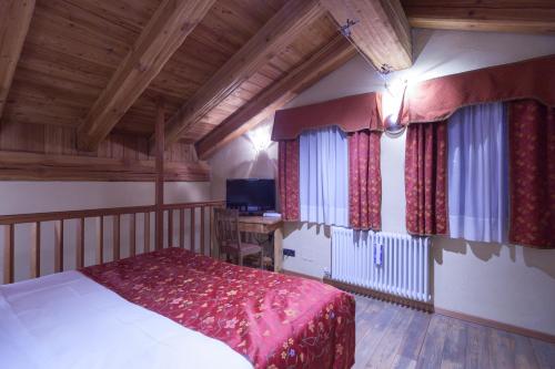 เตียงในห้องที่ Hotel Maison Saint Jean