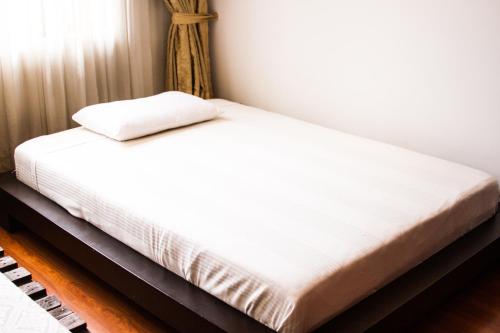 Una cama o camas en una habitación de D'lujo