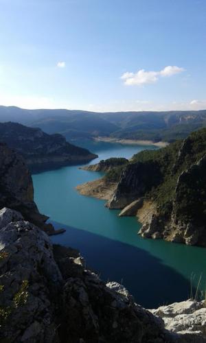 a view of a large body of water from a mountain at Casa Antonia in Vilaller