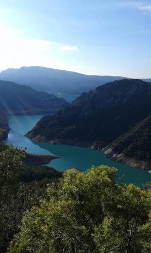 a view of a lake in the mountains at Casa Antonia in Vilaller