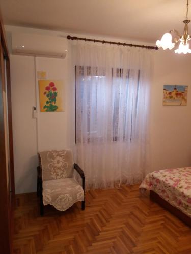 Ένα ή περισσότερα κρεβάτια σε δωμάτιο στο Apartment Meri