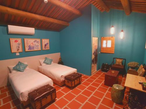 Postel nebo postele na pokoji v ubytování Zhu Shan Homestay