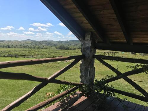 a view of a field from a window of a building at San Francisco De Las Sierras in Minas