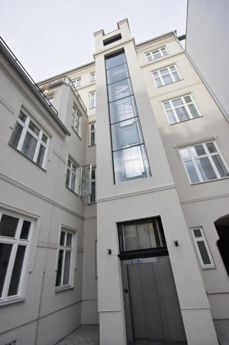 an apartment building with a door in front of it at Elizabeth Suites in Prague