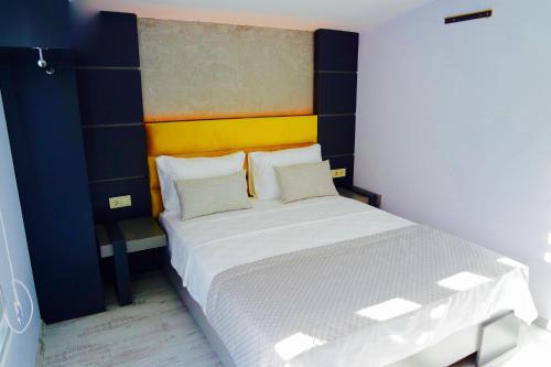 Katil atau katil-katil dalam bilik di Ale Park Hotel Apartments