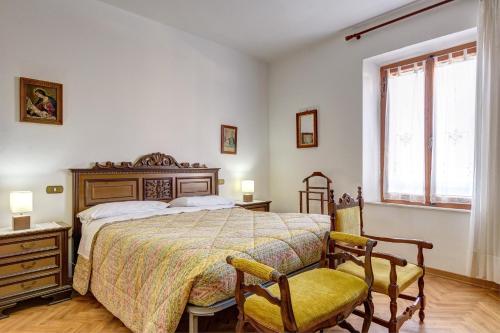 Giường trong phòng chung tại B&B Il Pozzo