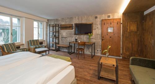 TV a/nebo společenská místnost v ubytování Hotel 2B