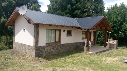 a small house with a solar roof at KaiKen Lauquen in Trevelin