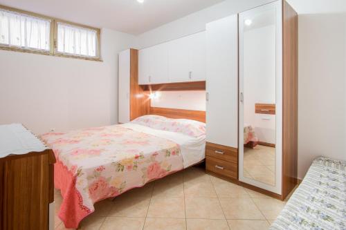 Postel nebo postele na pokoji v ubytování Apartment Dani