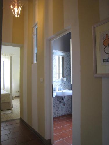 Postel nebo postele na pokoji v ubytování Fontelunga Hotel & Villas