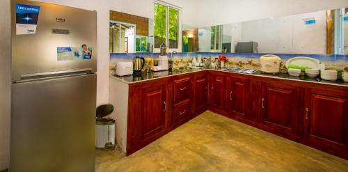 Dapur atau dapur kecil di Kamal Villa