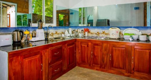 Dapur atau dapur kecil di Kamal Villa