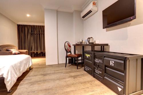 Una cama o camas en una habitación de Hotel Kristal