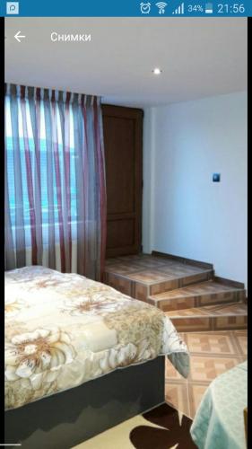 Katil atau katil-katil dalam bilik di Banya Guest Rooms 23