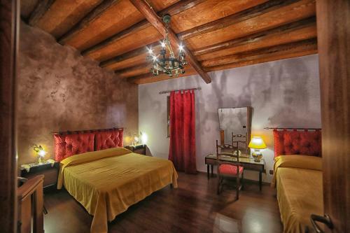 A bed or beds in a room at Casa Vacanze 4 Pileri
