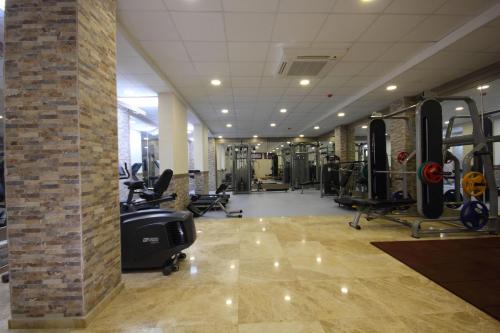 a gym with treadmills and equipment in a building at Dalyan Resort - Special Category in Dalyan