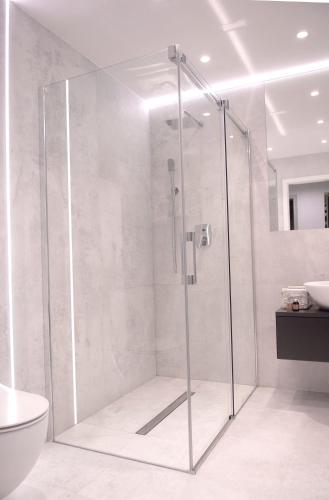 a shower with a glass door in a bathroom at Dr Mandryk HOUSE in Lublin
