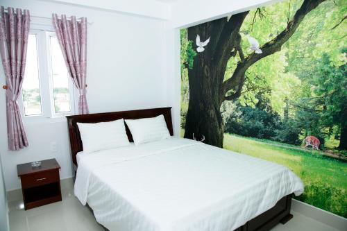 Giường trong phòng chung tại Hoang Dang Hotel