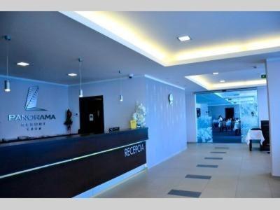 a lobby of a store with a counter in a room at Apartman Panorama 1001 in Štrbské Pleso