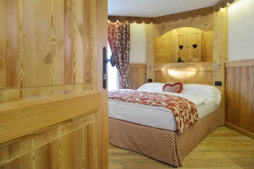Cama o camas de una habitación en Hotel Miravidi a Cervinia