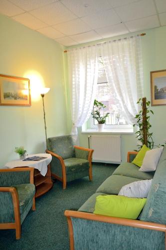 Posezení v ubytování Hotel Kapitan