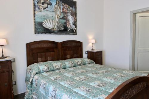 Ένα ή περισσότερα κρεβάτια σε δωμάτιο στο L'Antico Cipresso