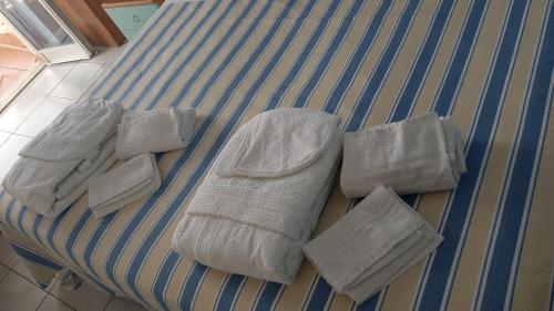Кровать или кровати в номере Hotel Ristorante La Scogliera - NUOVA GESTIONE